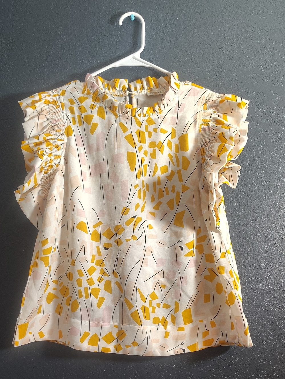 JODIFL Cream Blouse with Yellow & Light Pink Abstract Print and Ruffle Sleeves